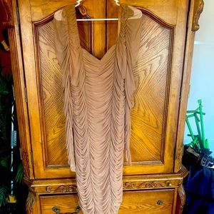 Beige new dress. Makes your body look amazing. Zipper in the back